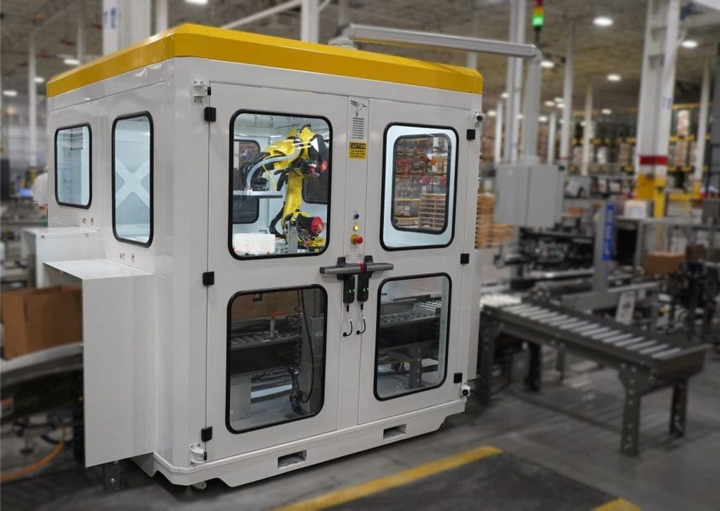 A Hummingbird Case Packer in a factory.