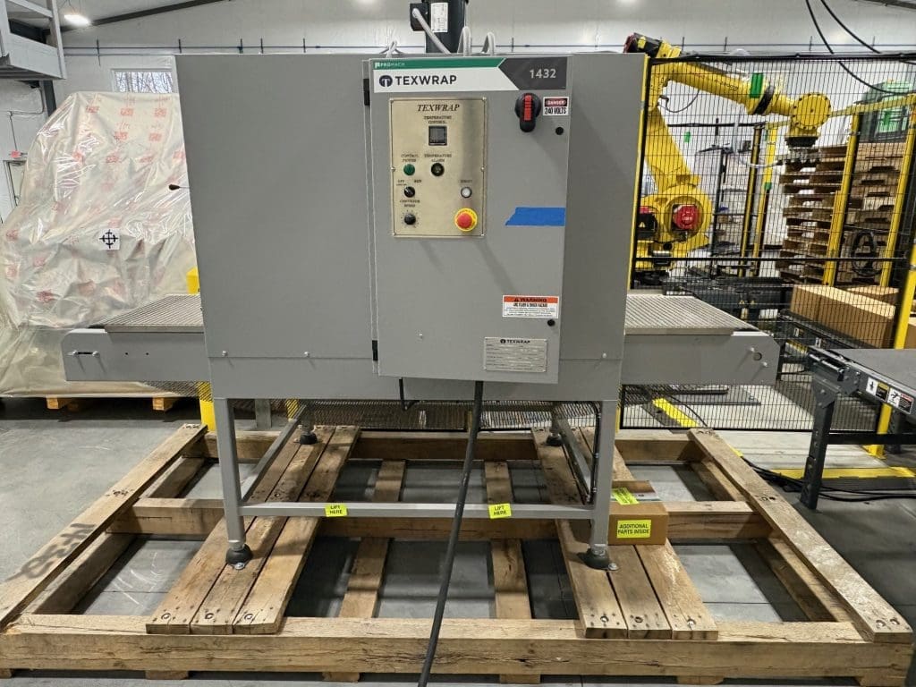 A silver Texwrap machine on a pallet
